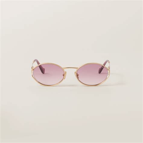 Lunettes de soleil Miu Miu Eyewear pour femme 